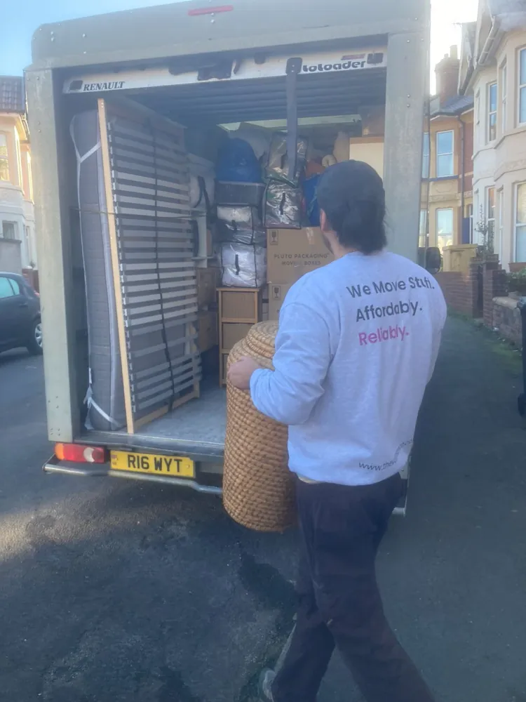 Loading a Luton van in a The Van Man Co jumper